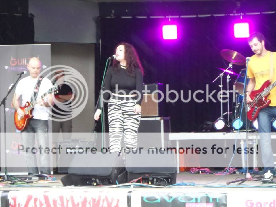 Guilty Pleasures Photos - On Stage at Linkfest in the rain